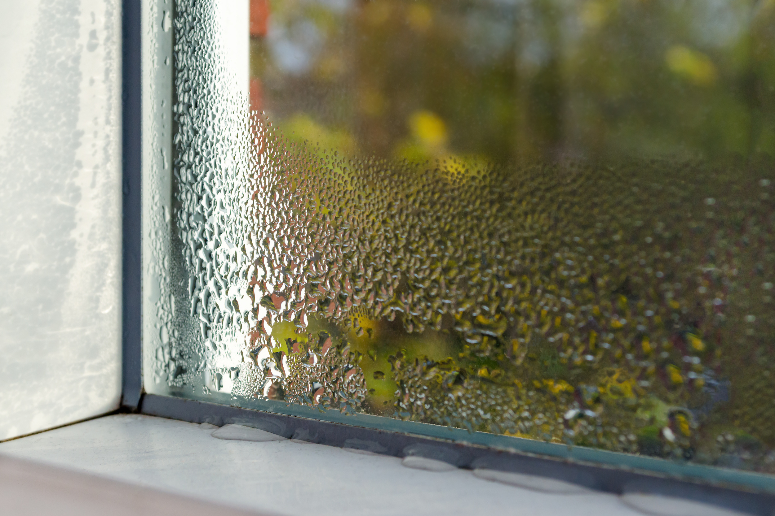 window with water drops closeup, inside, selective focus Μόνωση τοιχοποιίας